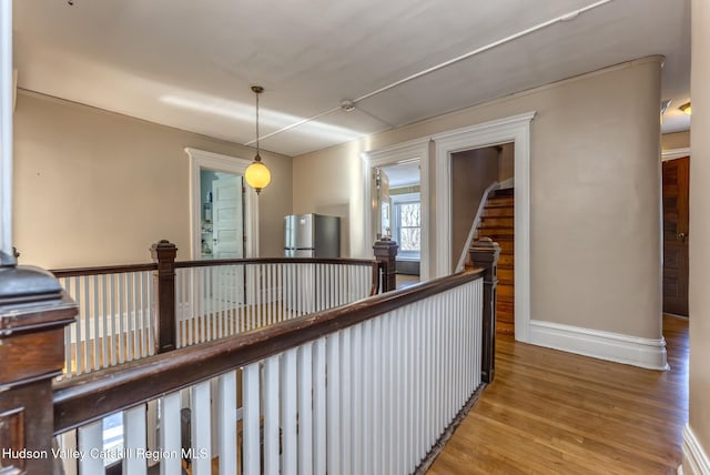 corridor featuring light hardwood / wood-style flooring