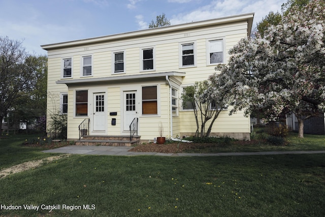 19-21 Moore, Chatham, NY 12037 - view of front facade with entry steps and a front lawn