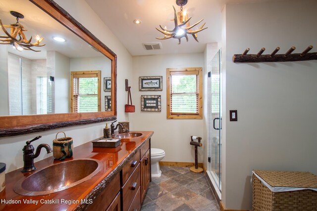 526 Taghkanic Rd, Elizaville, NY 12523 - full bathroom featuring plenty of natural light, double vanity, a shower stall, recessed lighting, and a chandelier