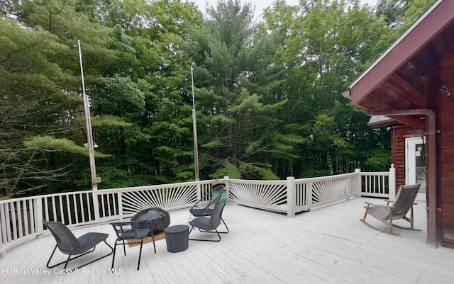 927 Queens Hwy, Accord, NY 12404 - wooden deck featuring view of wooded area