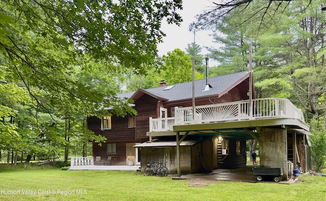 927 Queens Hwy, Accord, NY 12404 - back of house featuring a yard, a deck, a chimney, and a shingled roof