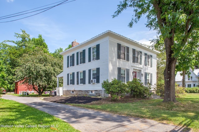 272 Main St, Middleburgh, NY 12122 - colonial house with a chimney and a front yard