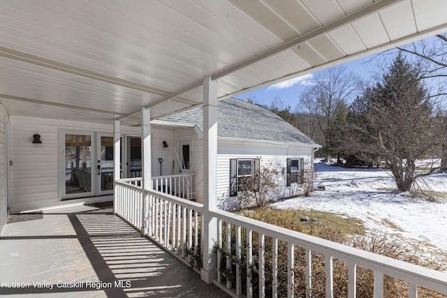 view of snow covered patio