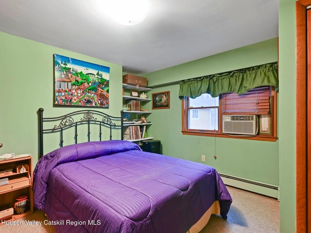 carpeted bedroom with cooling unit and a baseboard radiator