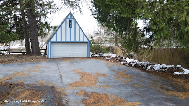 detached garage with fence