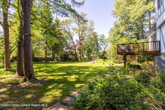 2 Malden Ave, Saugerties, NY 12477 - view of grassy yard with a wooden deck