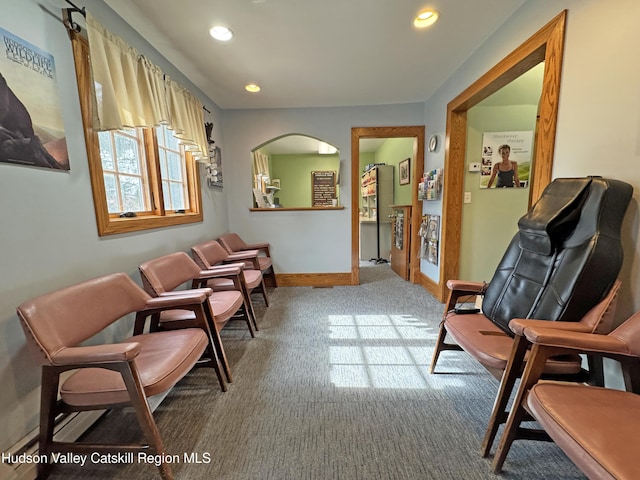 sitting room with recessed lighting, carpet flooring, and baseboards