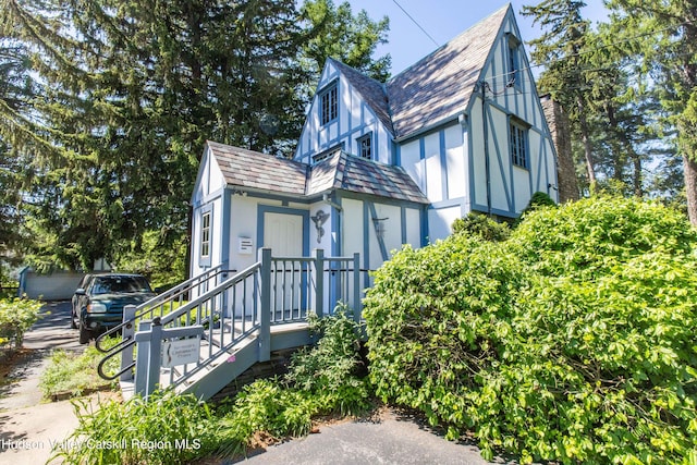 2 Malden Ave, Saugerties, NY 12477 - tudor-style house with a shingled roof and stucco siding