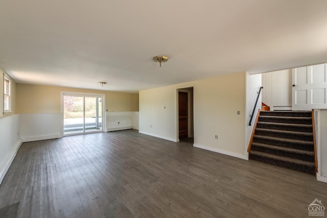 1536 State Route 213, Marbletown, NY 12440 - unfurnished living room with stairs and dark wood-style flooring