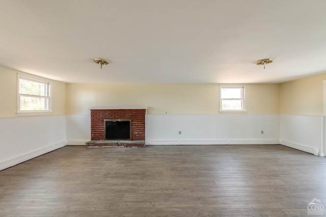 1536 State Route 213, Marbletown, NY 12440 - unfurnished living room with wood finished floors and a brick fireplace