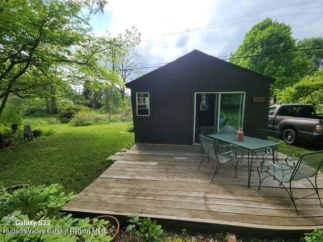 40 N Mountain, Copake Falls, NY 12517 - deck with outdoor dining space and a yard