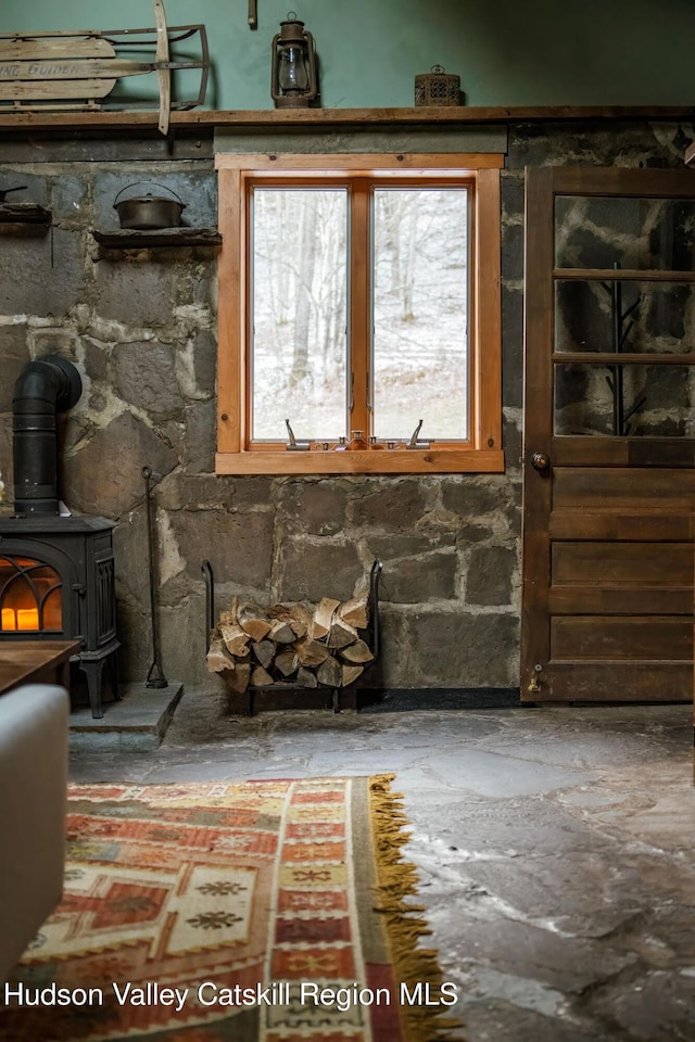 interior details featuring a wood stove