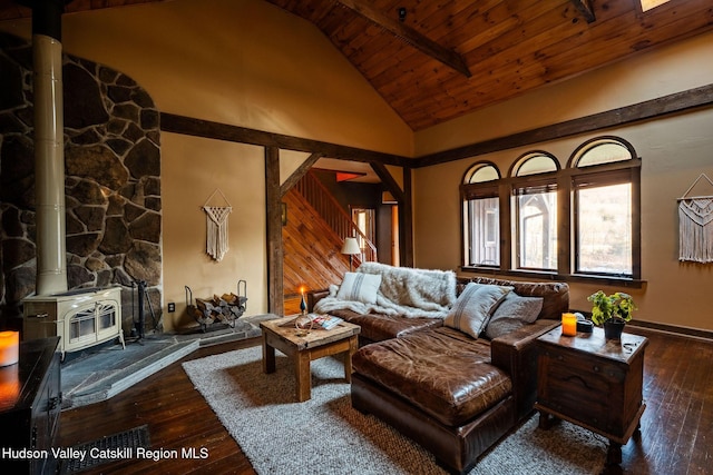 living area with wood-type flooring, high vaulted ceiling, wood ceiling, and a wood stove