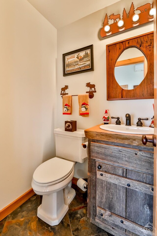 90 Club Rd, Windham, NY 12496 - bathroom with toilet, baseboards, and vanity