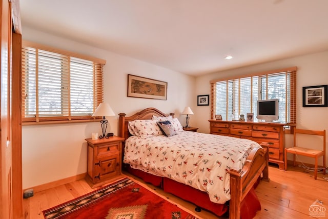 90 Club Rd, Windham, NY 12496 - bedroom with light wood-type flooring, multiple windows, recessed lighting, and baseboards