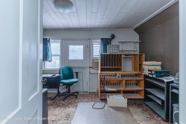 interior space with a wealth of natural light, concrete floors, and wooden ceiling