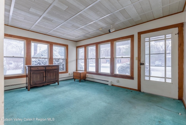 unfurnished sunroom with baseboard heating and a healthy amount of sunlight