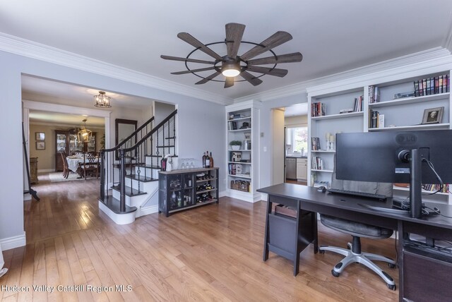 157 Hillside Ter, Kingston, NY 12401 - office area featuring ceiling fan, wood finished floors, crown molding, and built in features