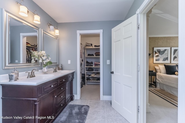 157 Hillside Ter, Kingston, NY 12401 - bathroom featuring double vanity and a spacious closet