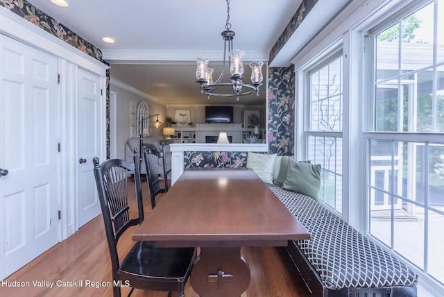 157 Hillside Ter, Kingston, NY 12401 - dining space featuring ornamental molding, a chandelier, and wood finished floors