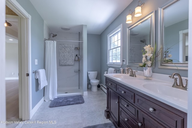 157 Hillside Ter, Kingston, NY 12401 - full bathroom featuring curtained shower, double vanity, a baseboard radiator, and tile patterned flooring