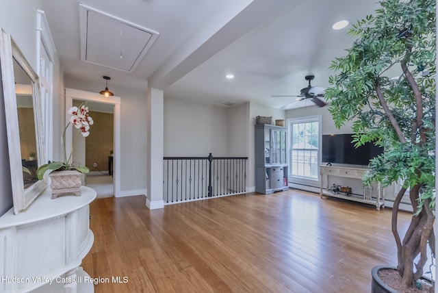 157 Hillside Ter, Kingston, NY 12401 - living room featuring attic access, wood finished floors, ceiling fan, a baseboard radiator, and recessed lighting