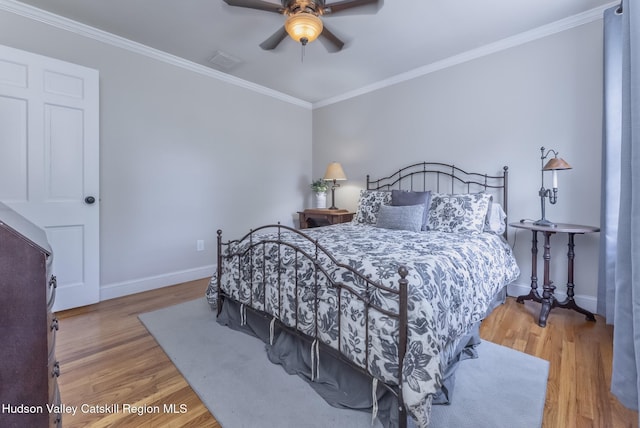 157 Hillside Ter, Kingston, NY 12401 - bedroom featuring wood finished floors, crown molding, and a ceiling fan
