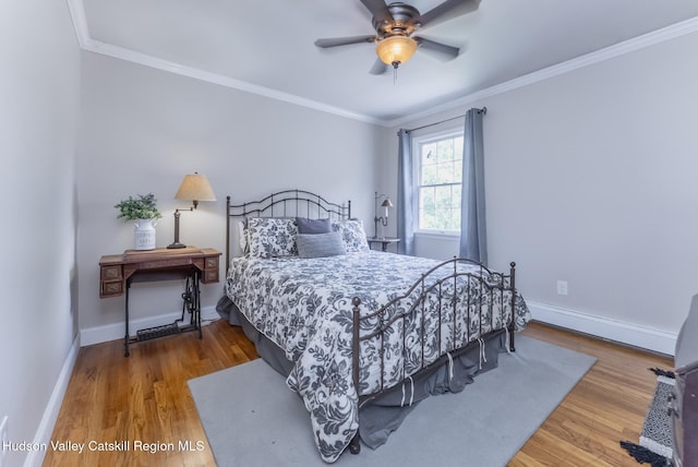 157 Hillside Ter, Kingston, NY 12401 - bedroom with wood finished floors, ornamental molding, and ceiling fan