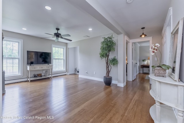 157 Hillside Ter, Kingston, NY 12401 - living room with a ceiling fan, light wood-style flooring, baseboard heating, and recessed lighting