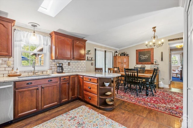 803 County Route 27, Ancram, NY 12502 - kitchen with dishwasher, a peninsula, dark wood finished floors, ornamental molding, and open shelves