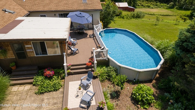 803 County Route 27, Ancram, NY 12502 - swimming pool with a yard, a deck, a patio, and outdoor dining area