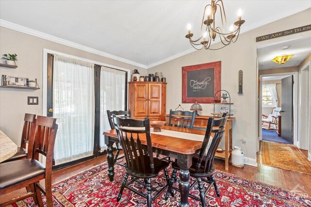 803 County Route 27, Ancram, NY 12502 - dining space with wood finished floors, a chandelier, and ornamental molding