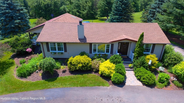 803 County Route 27, Ancram, NY 12502 - view of front of house with a chimney and a front yard
