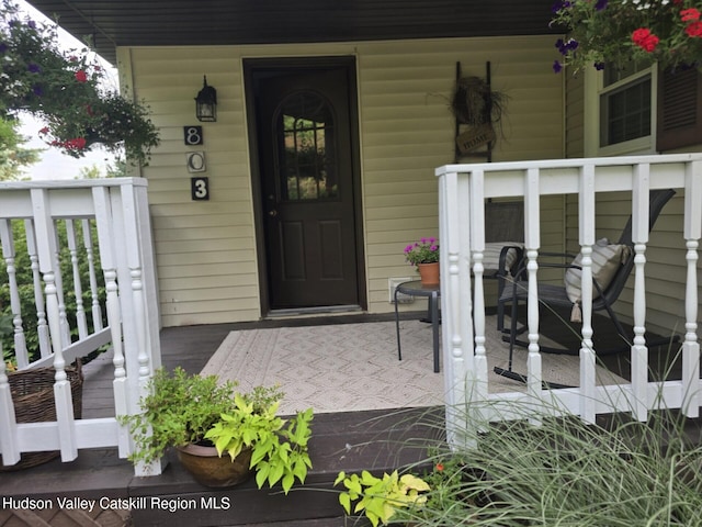 803 County Route 27, Ancram, NY 12502 - view of exterior entry featuring covered porch