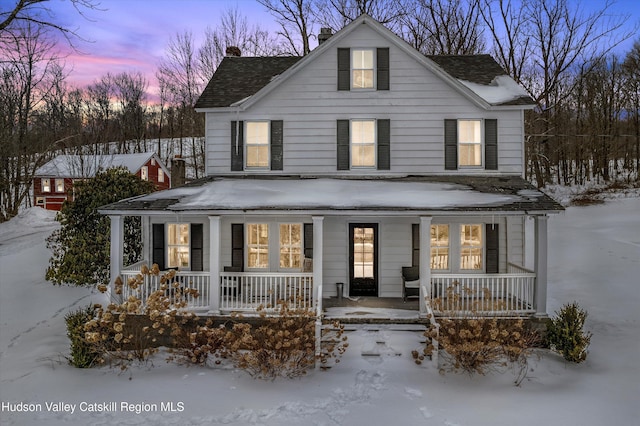 view of front of home featuring covered porch