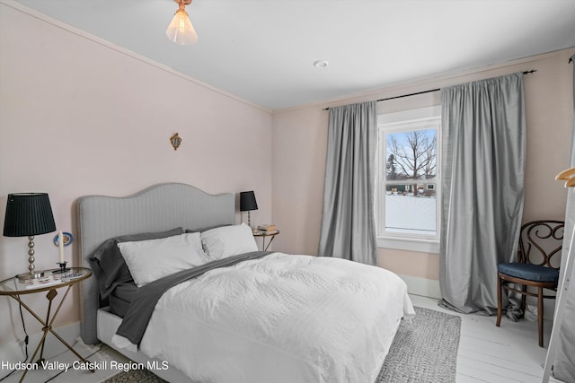 bedroom featuring light hardwood / wood-style floors