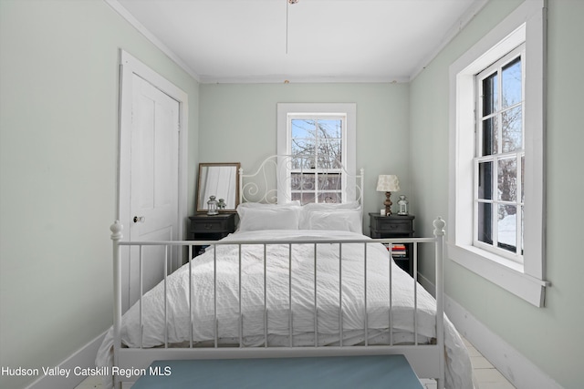 bedroom with crown molding