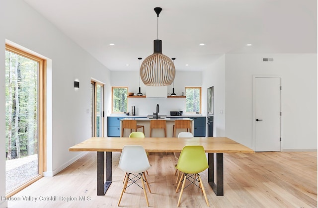 99 Cannon Cir, Woodstock, NY 12498 - dining space featuring light wood-style flooring, healthy amount of natural light, recessed lighting, and baseboards