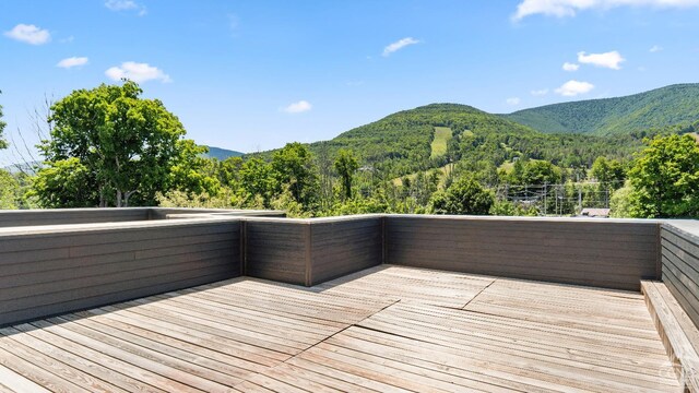 7717 Main St, Hunter, NY 12442 - wooden deck with a mountain view and a view of trees