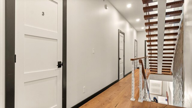7717 Main St, Hunter, NY 12442 - hall with recessed lighting, light wood-style flooring, and baseboards