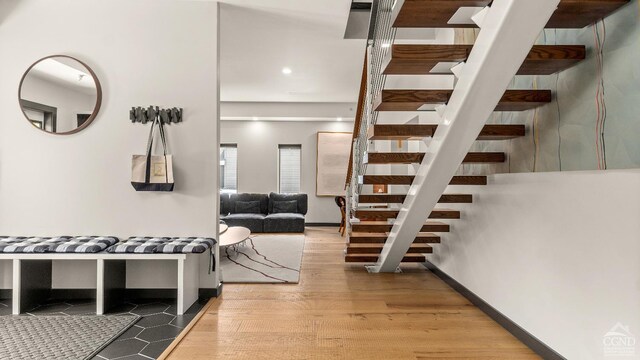 7717 Main St, Hunter, NY 12442 - hallway with stairway, wood finished floors, and baseboards