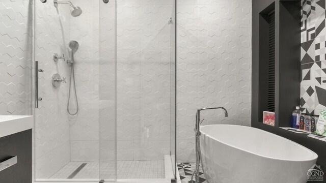 7717 Main St, Hunter, NY 12442 - bathroom with a freestanding bath and a stall shower