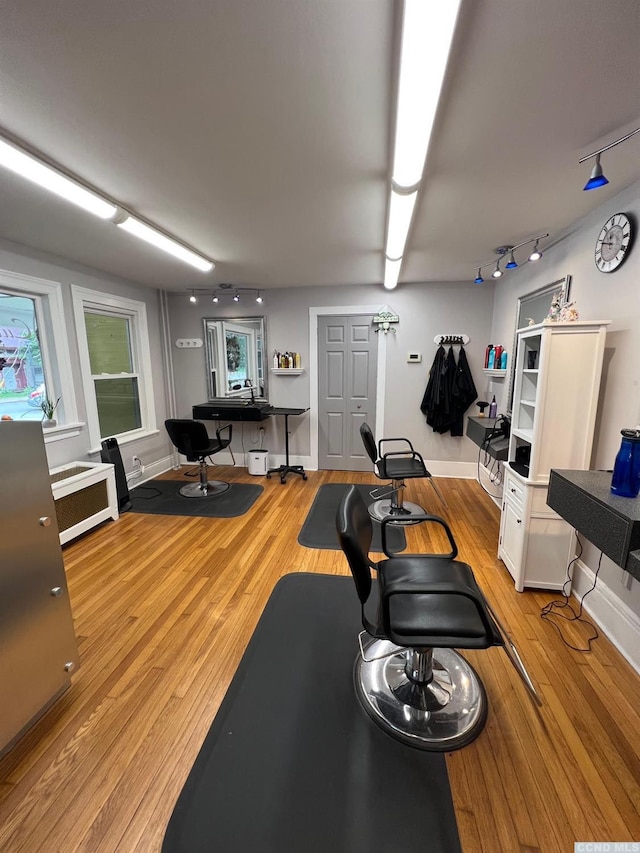 3652 Rte 67, Freehold, NY 12431 - workout room with rail lighting and light wood-style floors