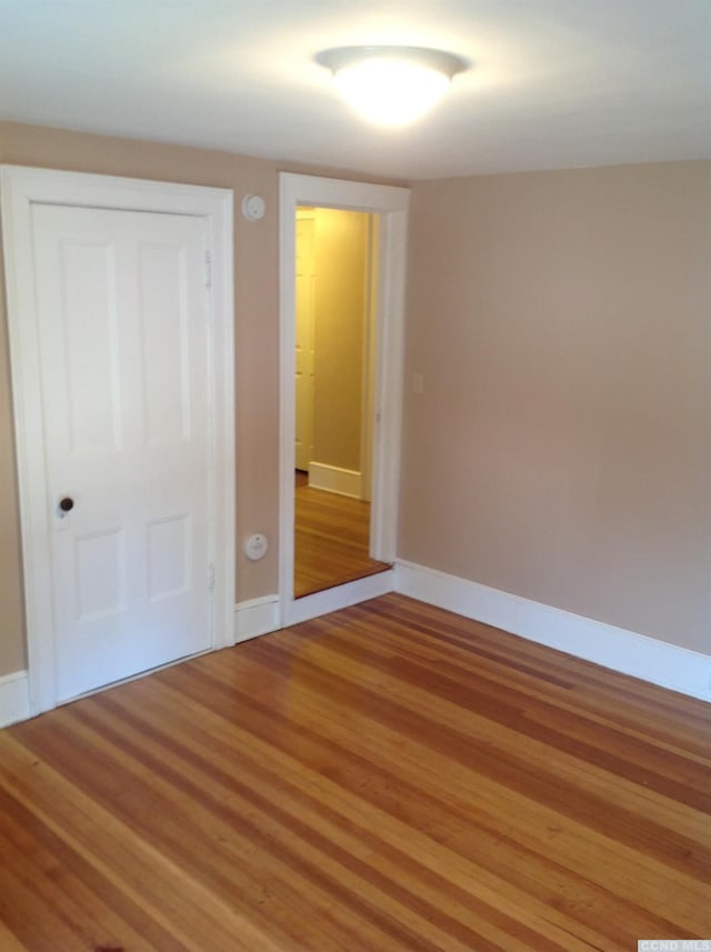 3652 Rte 67, Freehold, NY 12431 - unfurnished bedroom featuring light wood-type flooring and a closet
