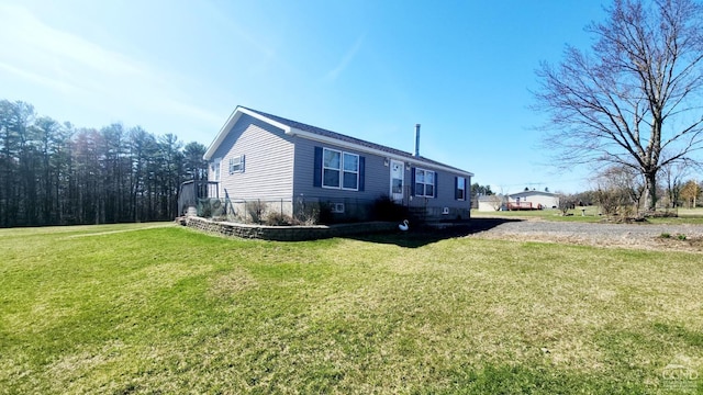 76 Gibson Rd, Durham, NY 12423 - view of front of house with a front yard and gravel driveway