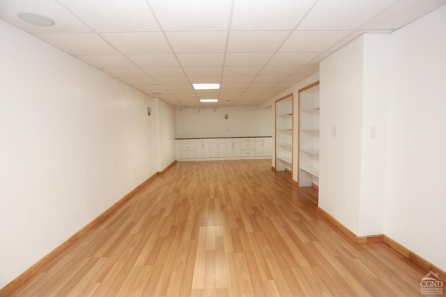 147 Skyview, Greenville, NY 12083 - basement with light wood-style floors, a paneled ceiling, and baseboards