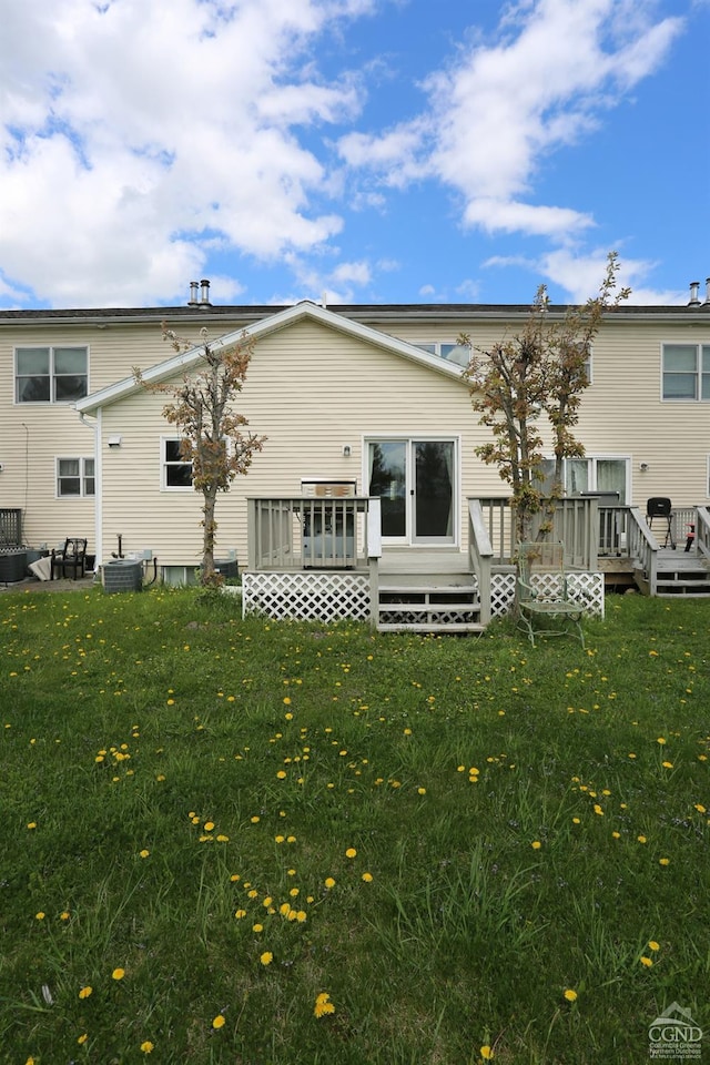 147 Skyview, Greenville, NY 12083 - rear view of house featuring a yard, a wooden deck, and central AC