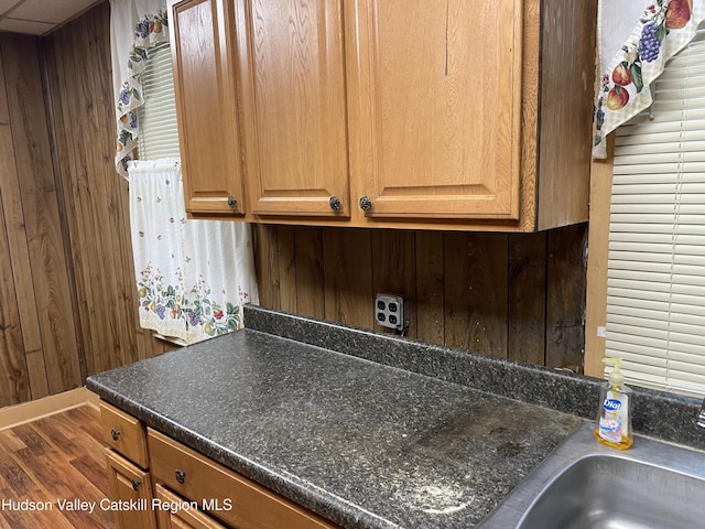 63 Gill St, Kingston, NY 12401 - kitchen view of dark countertops and wood walls