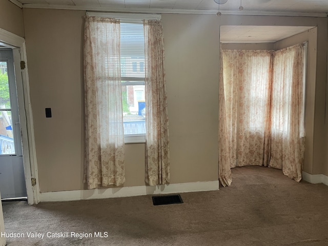 63 Gill St, Kingston, NY 12401 - carpeted empty room with baseboards