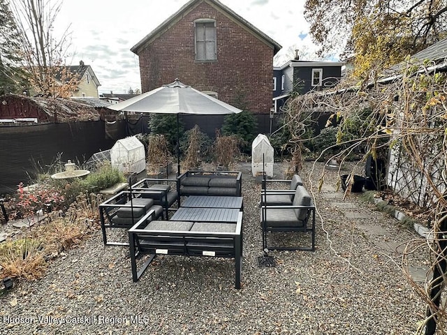 exterior space with an outdoor hangout area